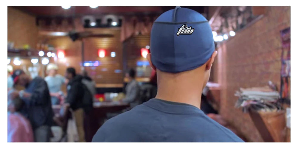 man wearing navy blue stringless durag from behind in retail store